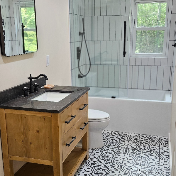 Manny's Renovation Logo